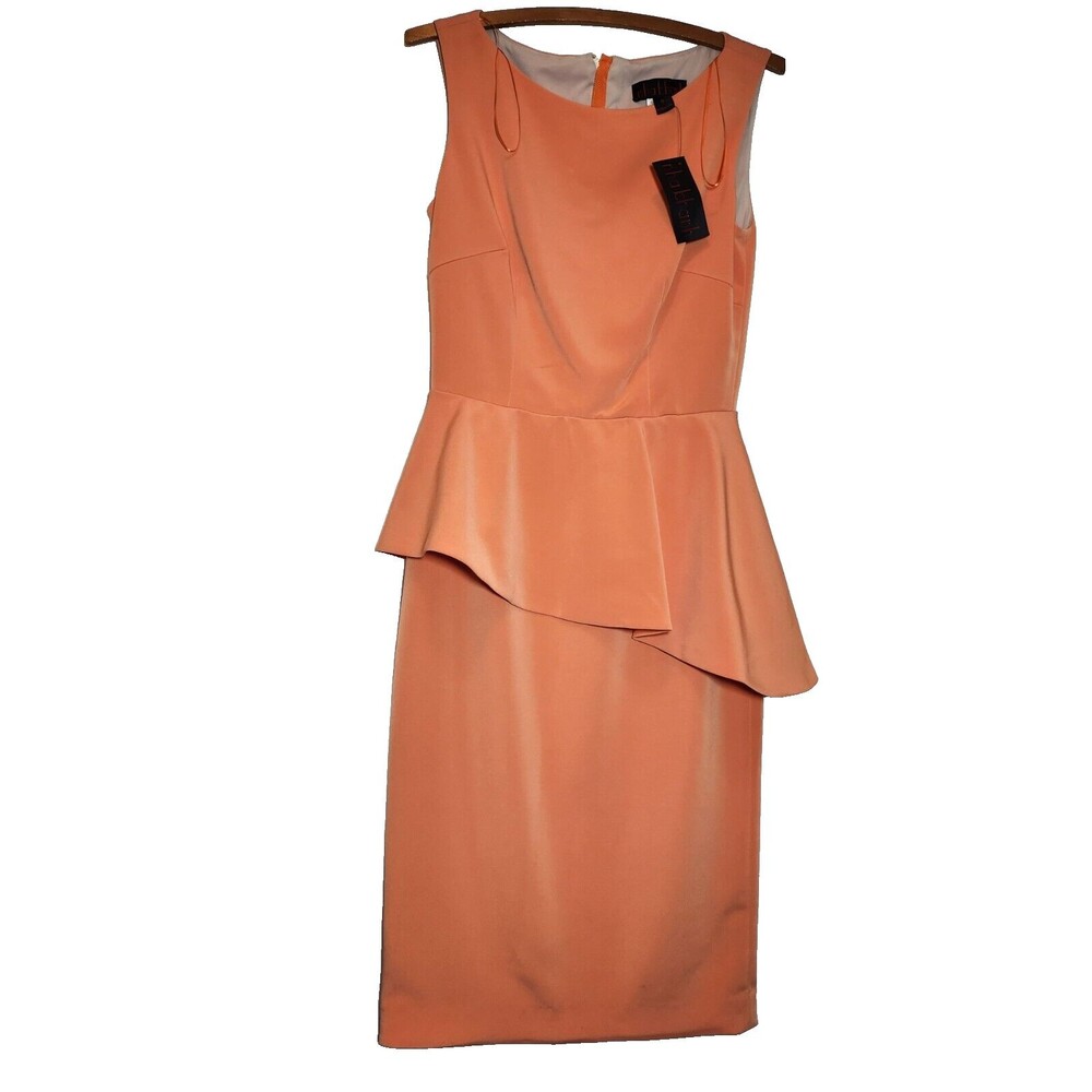 New nha khanh dress peplum dress burnt orange asymmetric size 6 US made classic